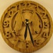 Penguin clock scroll saw cut