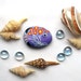 Painted rock stone art purple fish magnet