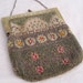 Antique beaded handbag with Ornate glass beaded design Heavy frame Well made