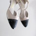 Size 6, vintage black and nude T-strap mary jane heels by Daisy, patent leather
