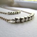 ON SALE: Silver and gold geometric double tiered necklace with silver faceted beads, mixed metal