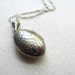 Sterling silver oval vintage locket, engraved on long silver chain
