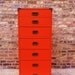 Vintage Campaign Dresser In Tangerine