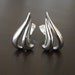 Vintage Monet Silver Swirl Earrings