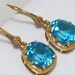 Estate Pre-Owned 14K YELLOW GOLD swiss blue topaz w/ french lever back closure