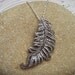 Sparkly Silver Feather Pendant Necklace