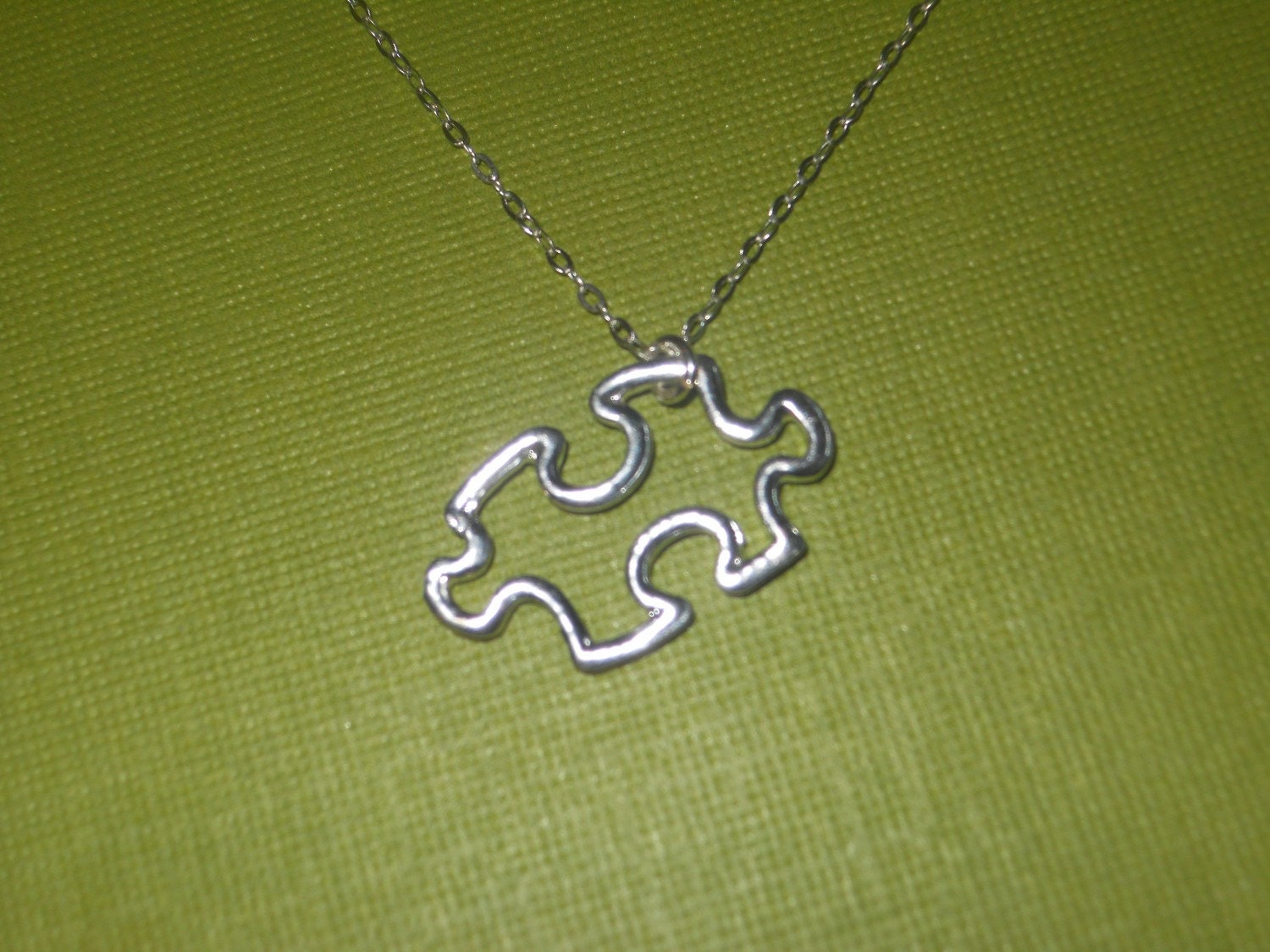 Puzzle Piece Necklace by thelovelyraindrop on Etsy