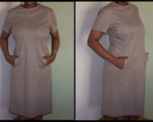 Faux-tweed 1960s shift dress with pockets.