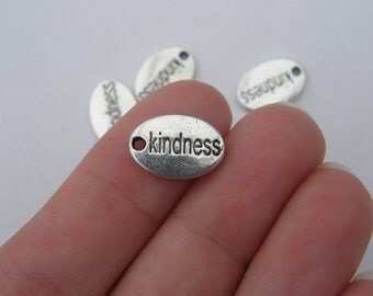 BULK 50 Kindness charms tibetan silver M266