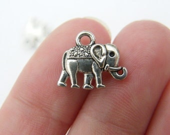 10 Elephant charms antique silver tone A536