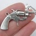 3 Gun pendants ( double sided ) 39 x 26mm tibetan silver G7