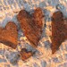 4 rusted tin hearts (H006)