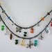 30% off - Indian Ramayana necklace. Hematite, with charms depicting the epic from Indian mythology