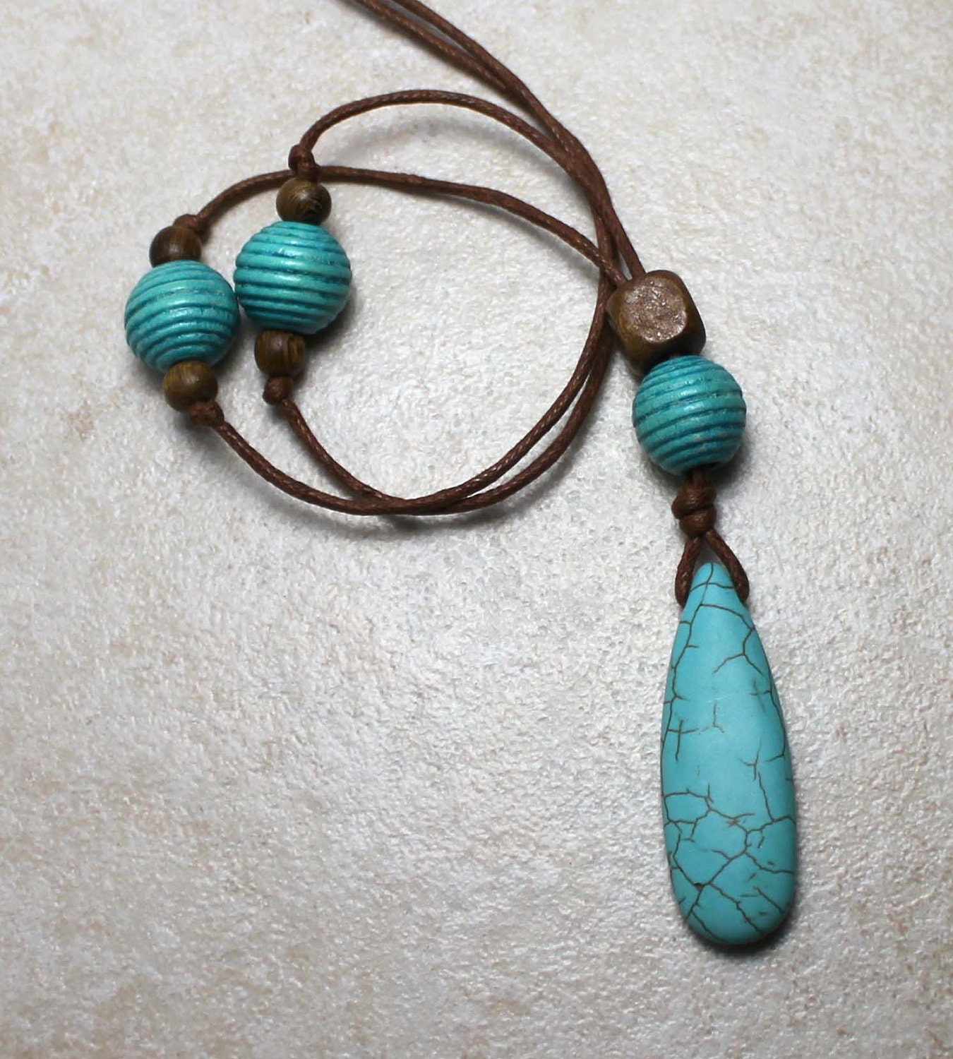 Peaceful Turquoise Pendant With Wooden Beads by prettylizard