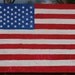 Hand painted distressed American flag door sign on canvas
