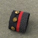 Fabric Cuff in Black, Red and Brass