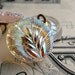 15mm small Czech glass buttons - iridescent leaf - pink undertone (4 buttons) hand forged