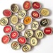 vintage salvaged antique cash register keys lot buttons upcycling repurposing supplies red white orange black patina rusty dirty old numbers
