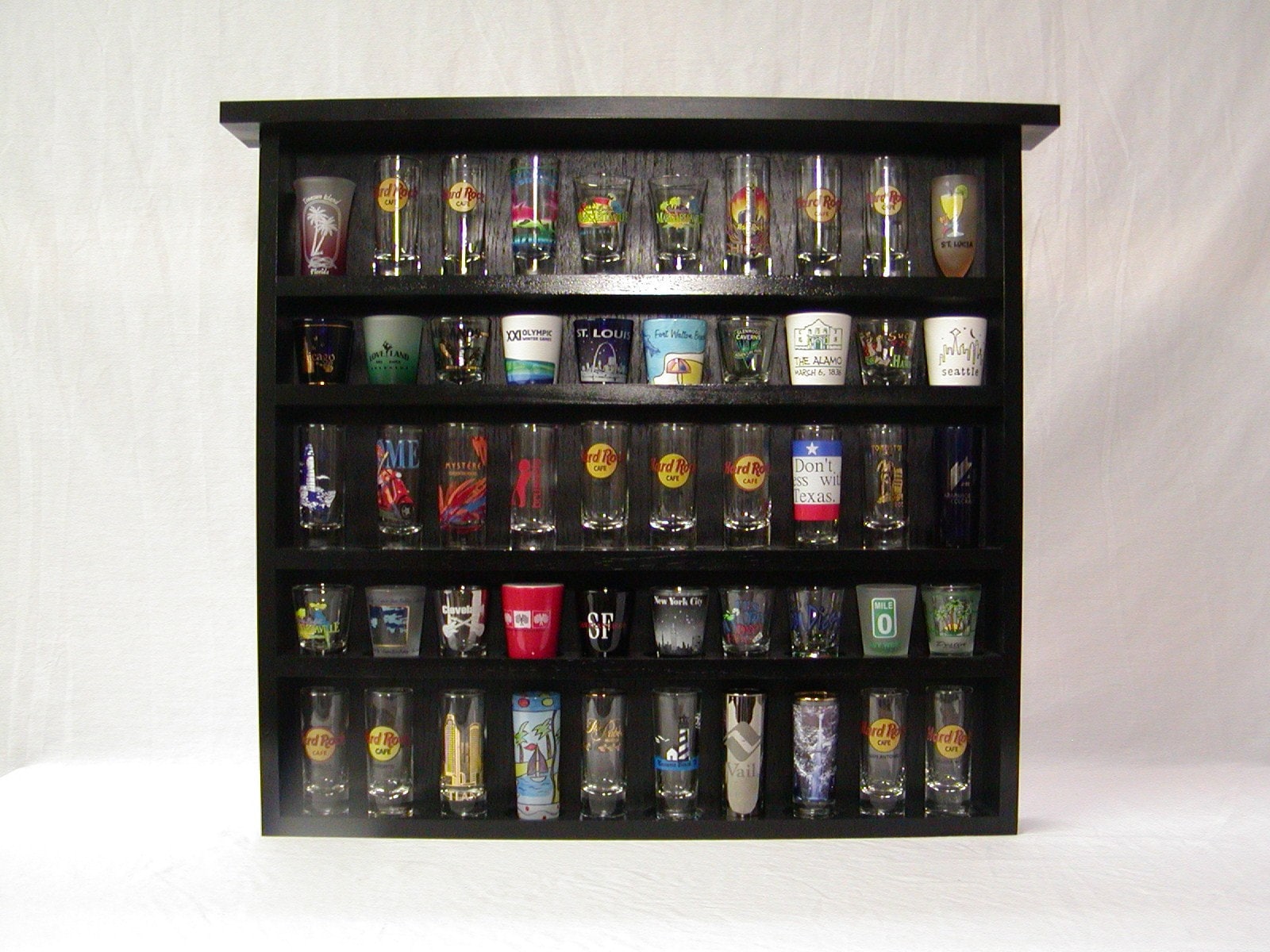 Shadow series 50 Shot Glass Display Case with Oak Background