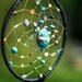 Dreamcatcher, black with turquoise and peacock feathers