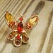 Vintage gold and amber rhinestone butterfly brooch