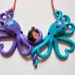Intertwined Octopi fighting for the last slice of cake