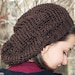 Hand knit hat. Chocolate brown slouchy mesh hat made of silky bamboo yarn. One size fits most. Handmade in Colorado