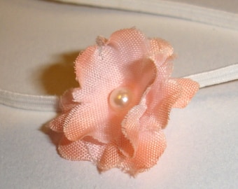 Baby Girl Headband...Tiny Peach Flower on a skinny elastic White Headband...Newborn Headband...Tiny Flower Headband