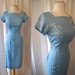 Lovely 1950's deadstock blue linen Hawaiian wiggle cocktail dress with sexy back vlv tiki rockabilly pin up - size Large