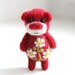 Miniature red felted summer bear