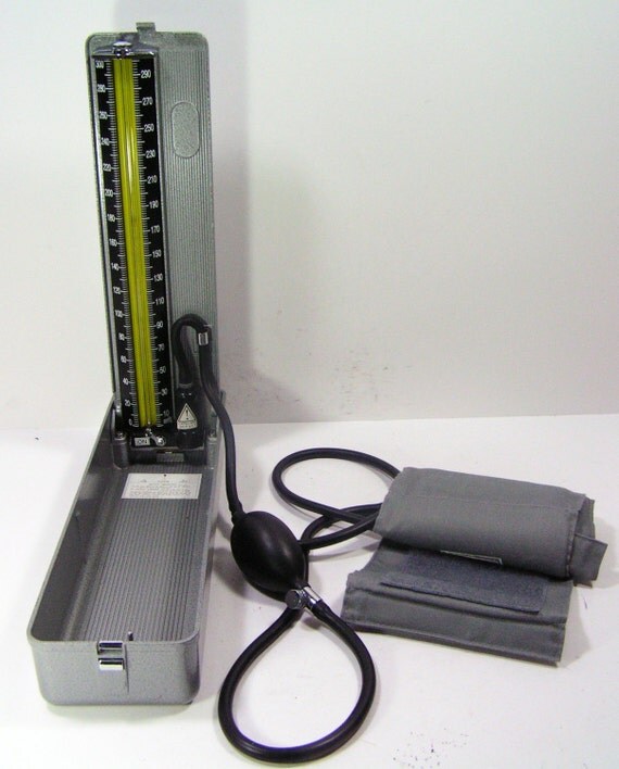 vintage blood pressure cuff medical device antique doctor