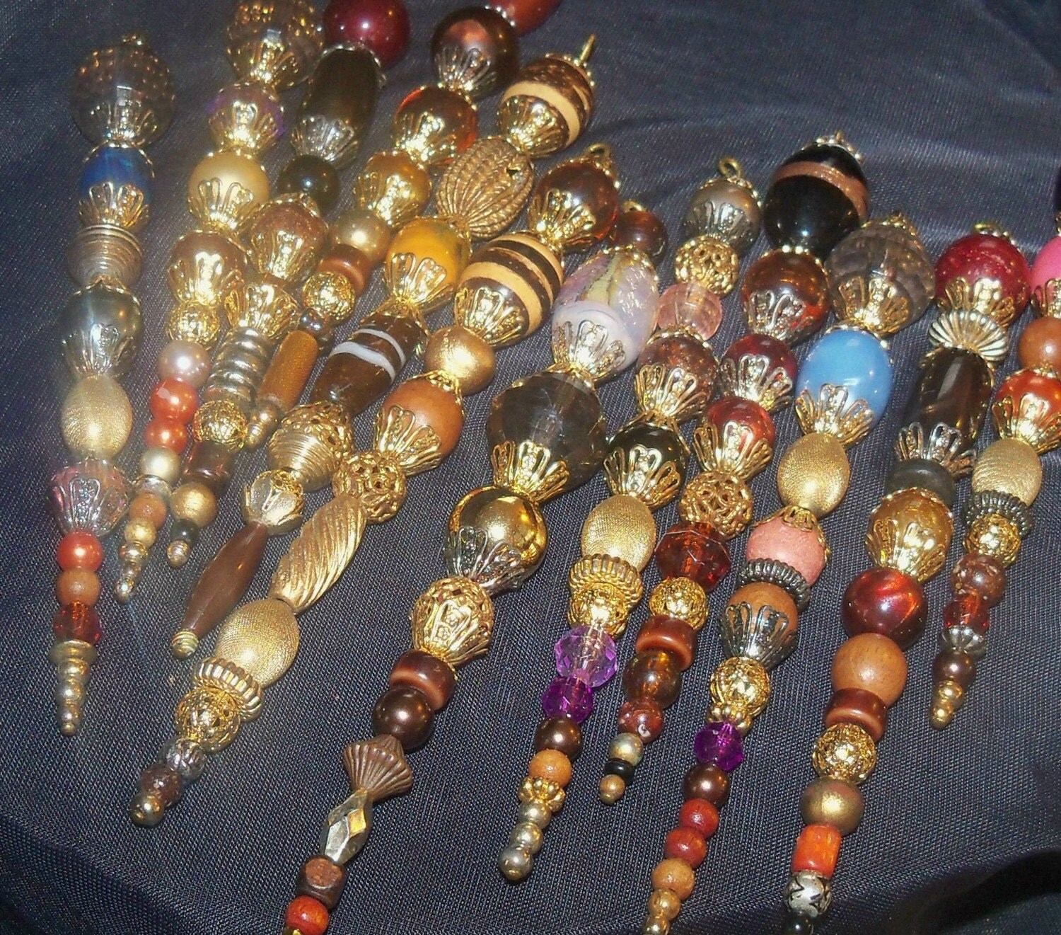 Christmas icycles. ornaments.Handmade my own design..dark beads and gold tones..unique sparkle your tree