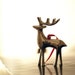 The Reindeer Effect - holiday decor. adorable Christmas ornament in the glowing sunlight - affordable whimsical holiday decor photograph - a cute fine art print 4x4 under 10