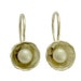 Delicate - Sterling silver earrings inlaid fresh water pearls.