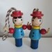 Pair of Vintage Wooden Dolls Two Sided with Happy and Sleeping Faces
