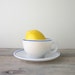 Milk Glass Tea Cup and Saucer with Blue Stripe Trim