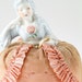 antique half doll pincushion