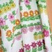 Cute floral cotton scarf by Ray Strauss. Juvenile, daisies, hippie, flower power, flower child, bandanna, neckerchief.