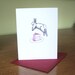 Rabbit leaping over cake greeting card, free shipping