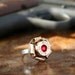 Bullet Ring, Curled 45 ACP Brass Casing, Solid Sterling Silver Shank, Swarovski Crystal Center