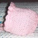 Knitted Baby Bonnet Hat Pink with crochet flower 3 to 6 months