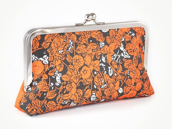 orange floral clutch bag