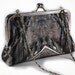 Art Deco styled clutch purse with photomontaged rock design and 8 inch frame with chain