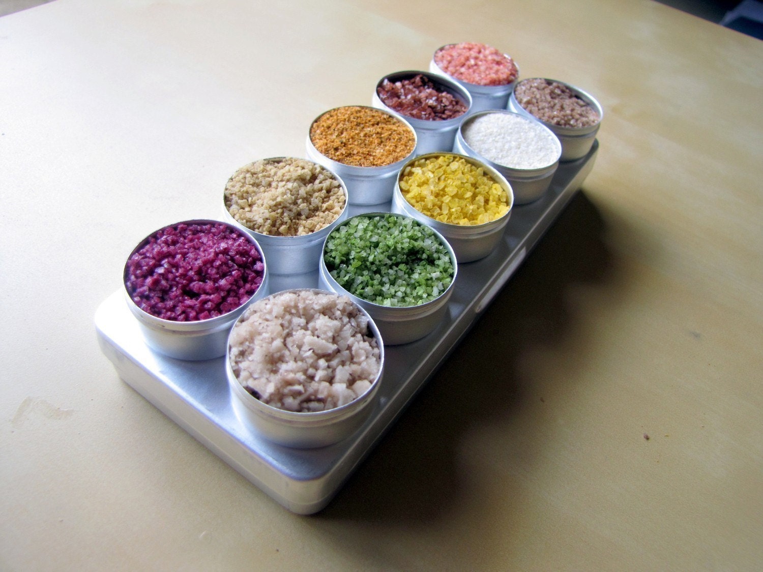 Gourmet naturally flavored sea salts ten 33mm diam tins