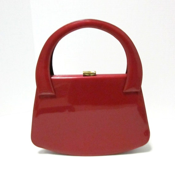 shiny red handbag