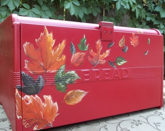 Red Bread Box with Fall leaves hand painted blowing in the wind up and over the box