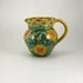 Blue porcelain handmade small pitcher with orange flowers