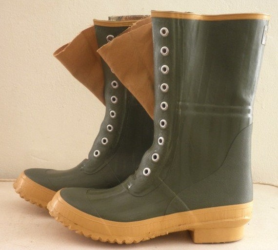 green rubber boots with yellow laces