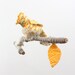 A little bird told me - sculpture on yarn wrapped branch in sunshine yellow, ocean blue, white, and peach
