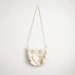 Vintage cream fabric shoulder bag.